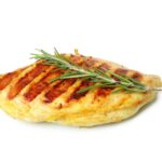 Grilled chicken breast isolated on white background